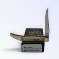 Case XX Toothpick with smooth natural bone and long clip blade, SKU 14024 — blades open resting on the factory box