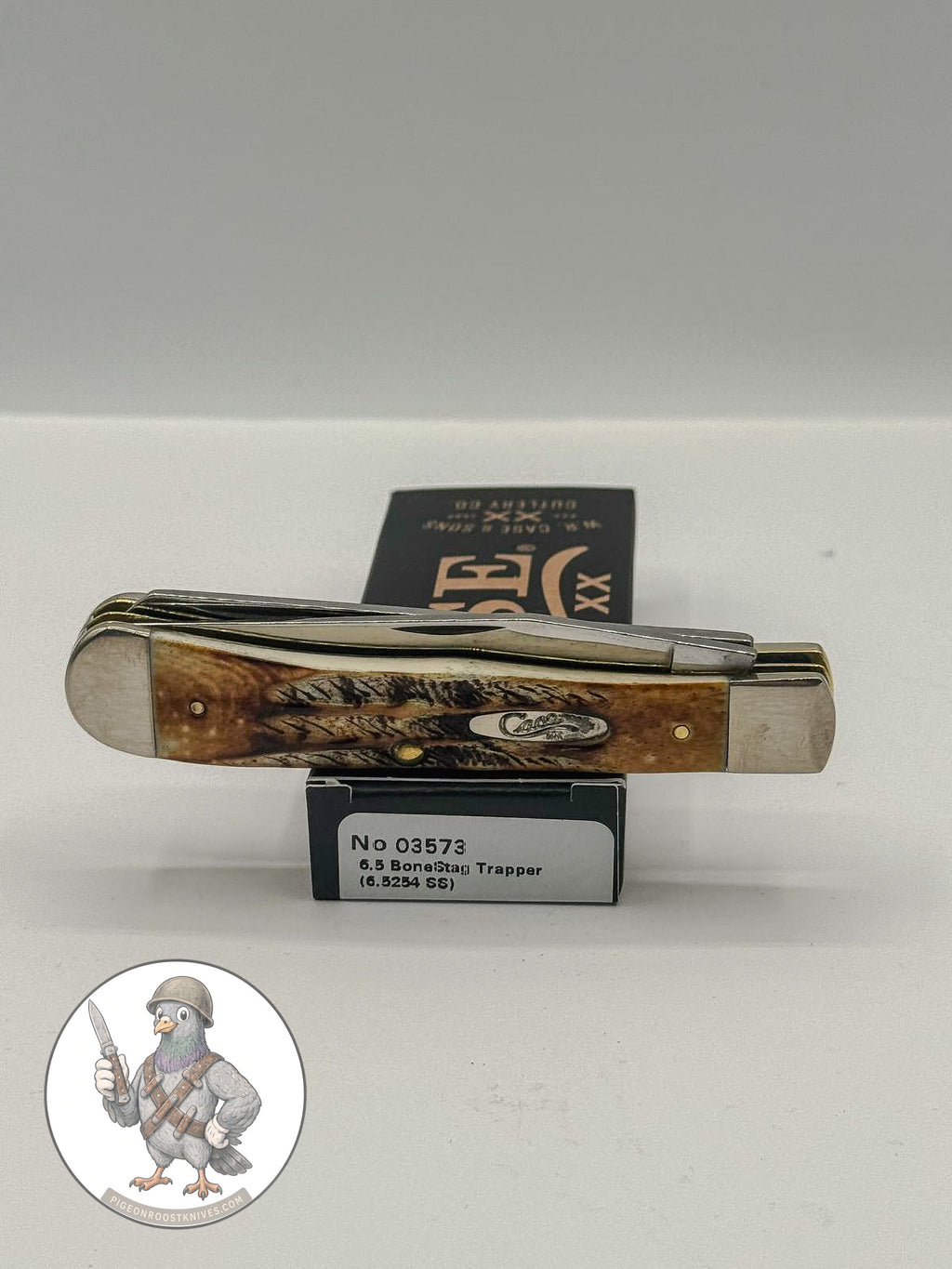 6.5 BoneStag Trapper by Case XX in BoneStag handles (03573), open on box with end label visible