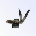 Case XX Trapper with 6.5 Bonestag with Wharncliffe, SKU 65329 — closed profile on the Case XX box
