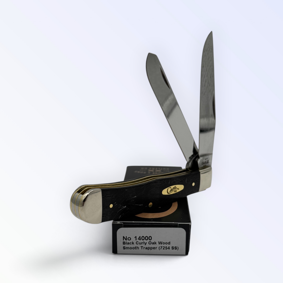 Trapper by Case XX in black curly oak wood (14000), three-quarter open shot showing handle and blades
