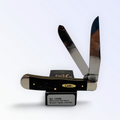 Case XX Trapper with black curly oak wood and clip and spey blades, SKU 14000 — blades open resting on the factory box