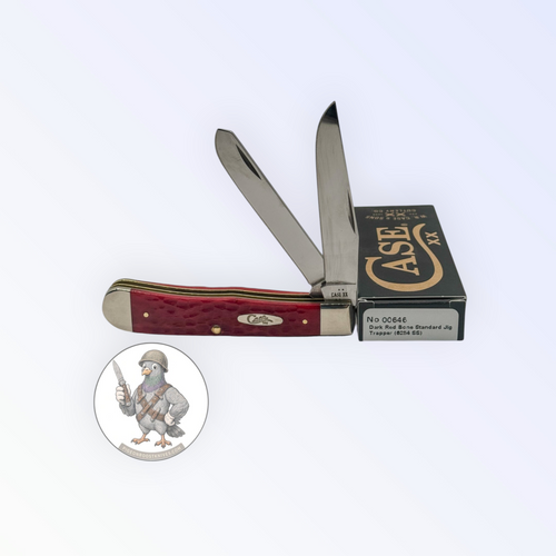 Case XX 00646 Trapper in Dark Red Jigged Bone 6254 SS — open blades resting on factory packaging