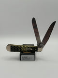 Case XX Trapper 80161HC: Honey Comb Smooth Yellow Synthetic, angled view showing handle texture and bolsters