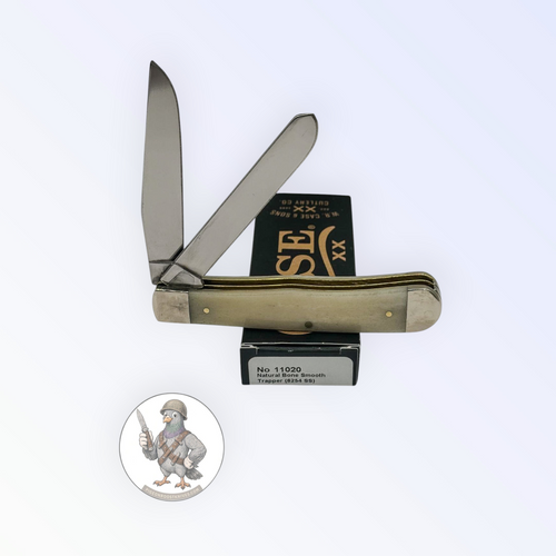 Case XX 11020 Trapper in smooth natural bone with brass shield — angled open view on Case XX packaging