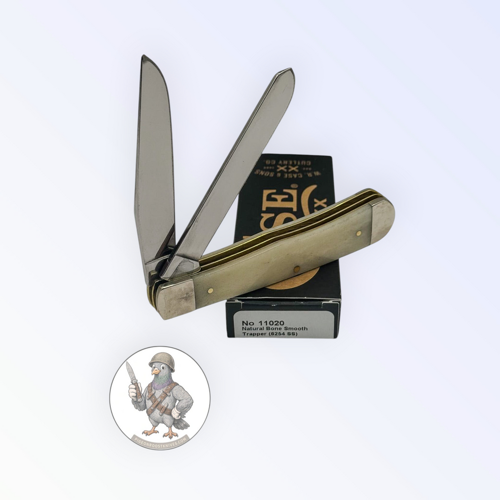 Trapper by Case XX in smooth natural bone with brass shield (11020), open on box with end label facing forward