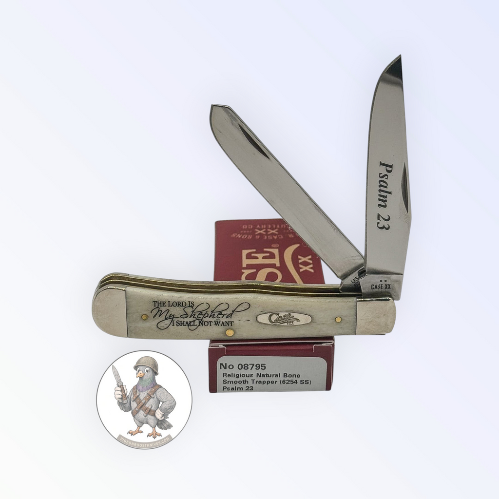 Case XX Trapper with Psalm 23 smooth natural bone and religious saying etched blades, SKU 08795 — blades open resting on the factory box