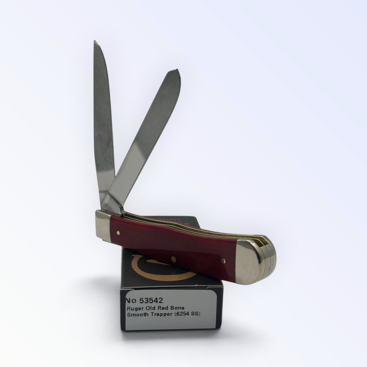 Case XX Trapper 53542: Ruger smooth red, open on box with label visible