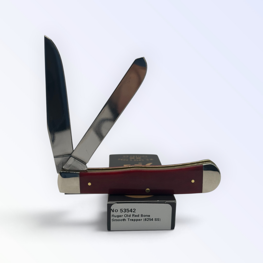 Catalog 53542 Case XX Trapper — Ruger smooth red, studio shot open atop the retail box