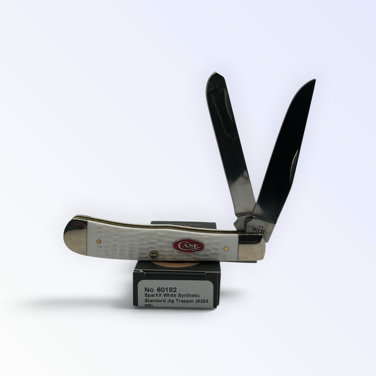 Pigeon Roost Knives Case XX SparXX Trapper pocket knife with white jigged synthetic handle and two stainless blades