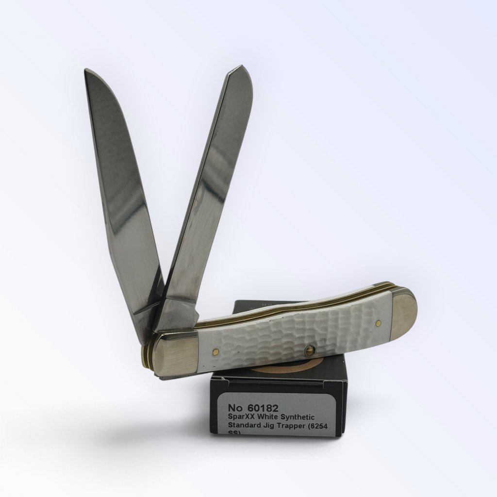 Pigeon Roost Knives Case XX SparXX Trapper pocket knife with white jigged synthetic handle and two stainless blades.