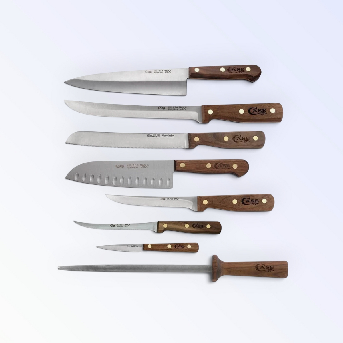 Case XX 10249 walnut-handle kitchen knives and sharpening steel — chef, slicer, bread, santoku laid out