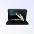 Pigeon Roost Knives Case XX Wild Game Series Trapper knife with smooth bone handle in a decorative display gift tin.
