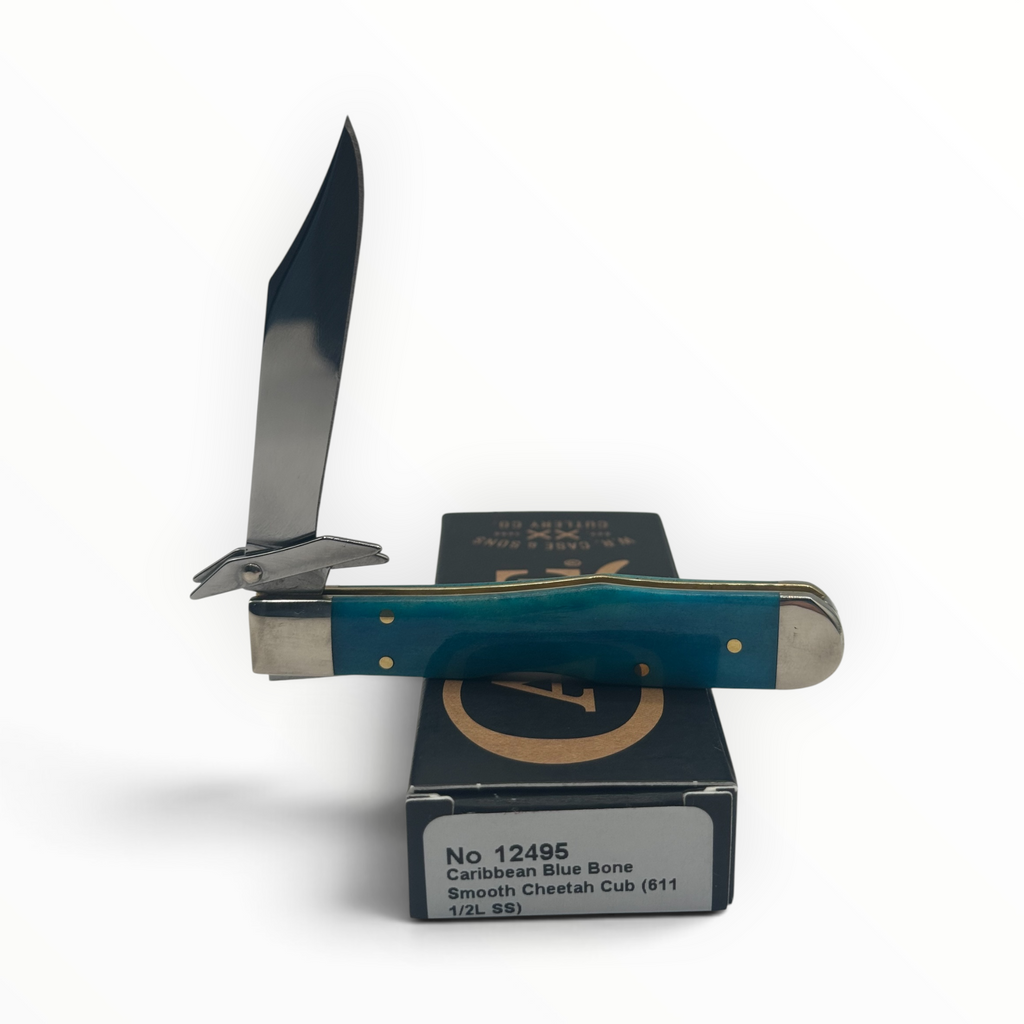 Pigeon Roost Knives Case XX Cheetah Cub with smooth Caribbean blue bone handle, swing guard, and stainless steel blade.