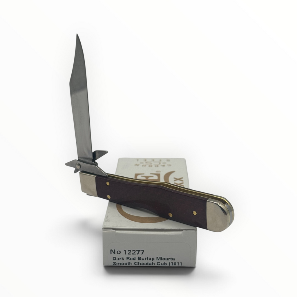 Pigeon Roost Knives Case XX Cheetah Cub pocket knife with dark red burlap Micarta handle and swing guard blade