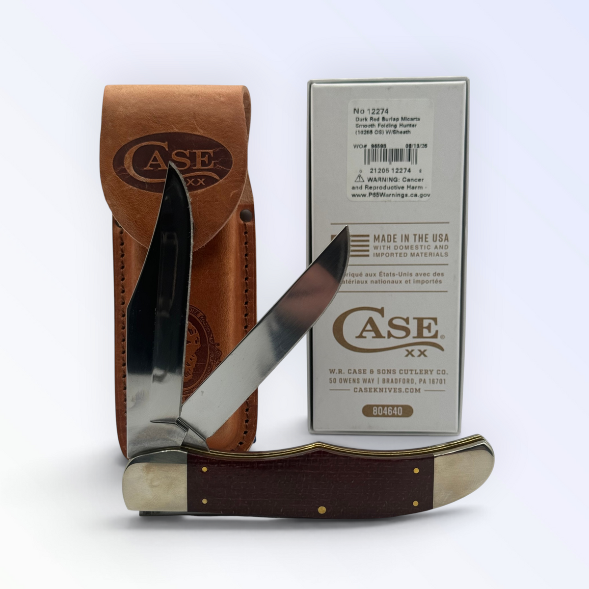 Pigeon Roost Knives Case XX Folding Hunter with dark red burlap Micarta handle, carbon steel blades, and leather sheath