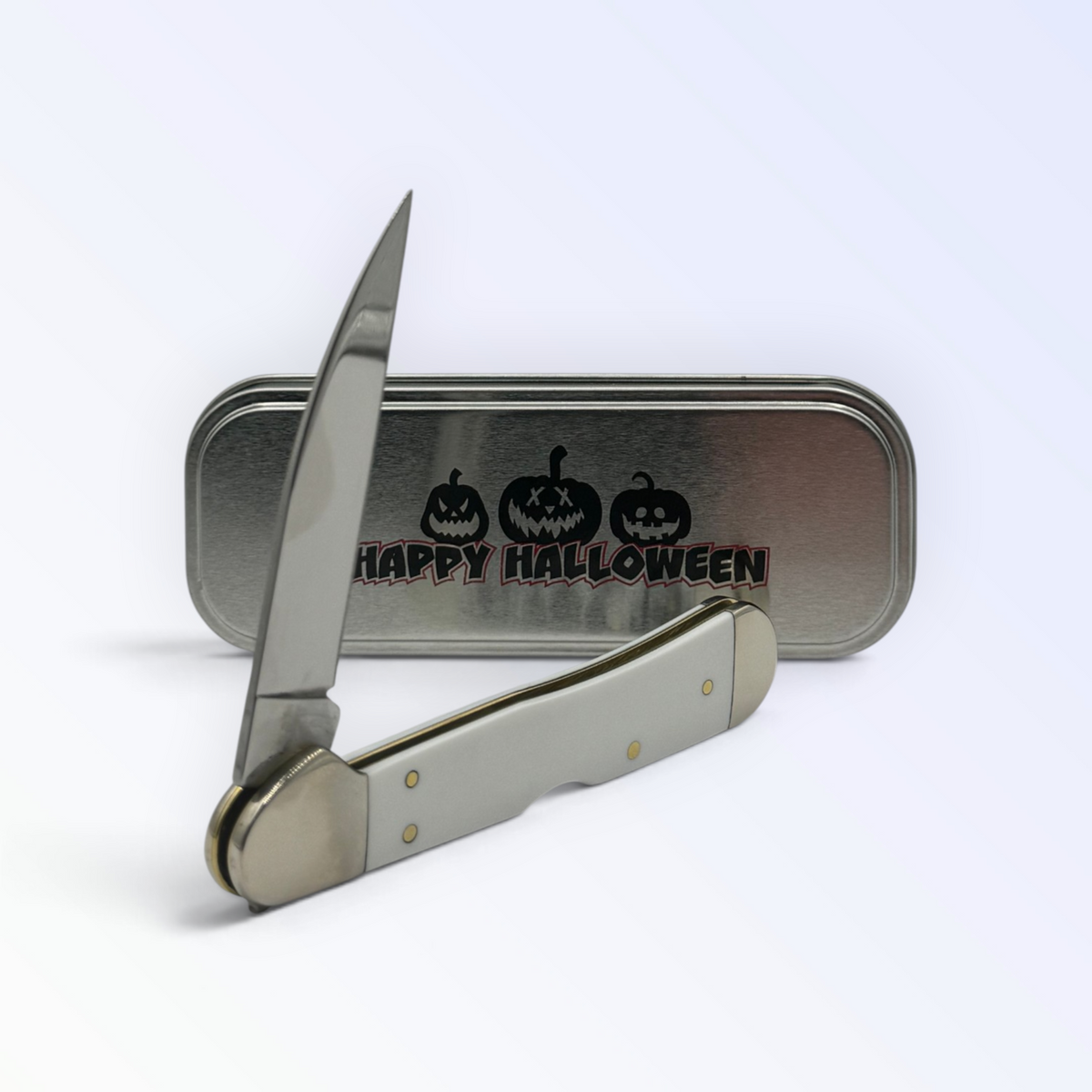 Pigeon Roost Knives Case XX Happy Halloween Copperlock pocket knife with white handle and matching metal gift tin