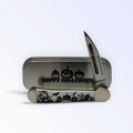 Pigeon Roost Knives Case XX Halloween Copperlock pocket knife with white handle and graveyard scene in a metal tin
