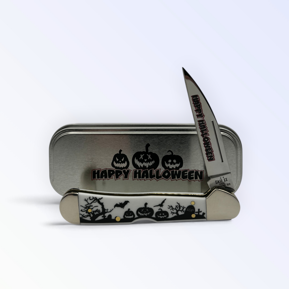 Pigeon Roost Knives Case XX Halloween Copperlock pocket knife with white handle and graveyard scene in a metal tin