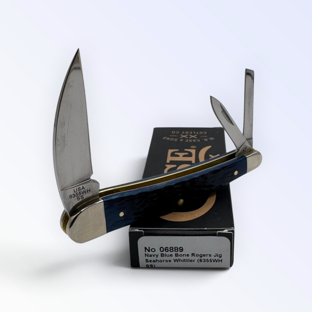 Pigeon Roost Knives Case XX Seahorse Whittler pocket knife with navy blue jigged bone handle and three steel blades.