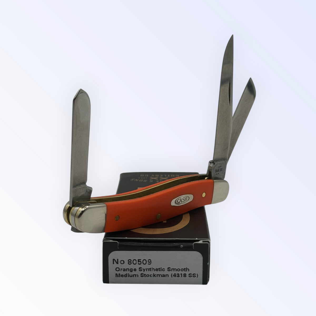 Pigeon Roost Knives Case XX Medium Stockman pocket knife with a smooth orange synthetic handle and three steel blades.