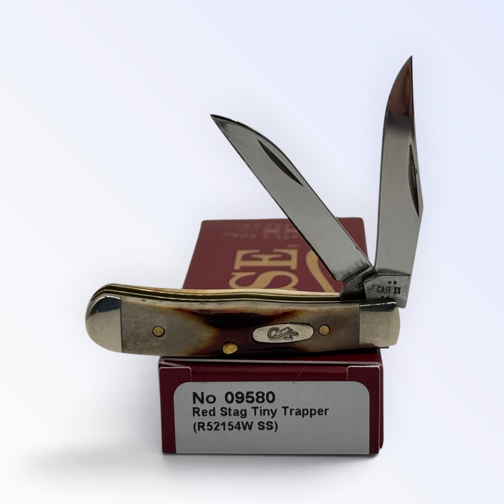 Pigeon Roost Knives Case XX Red Stag Tiny Trapper pocket knife with two open stainless steel blades on its box 09580