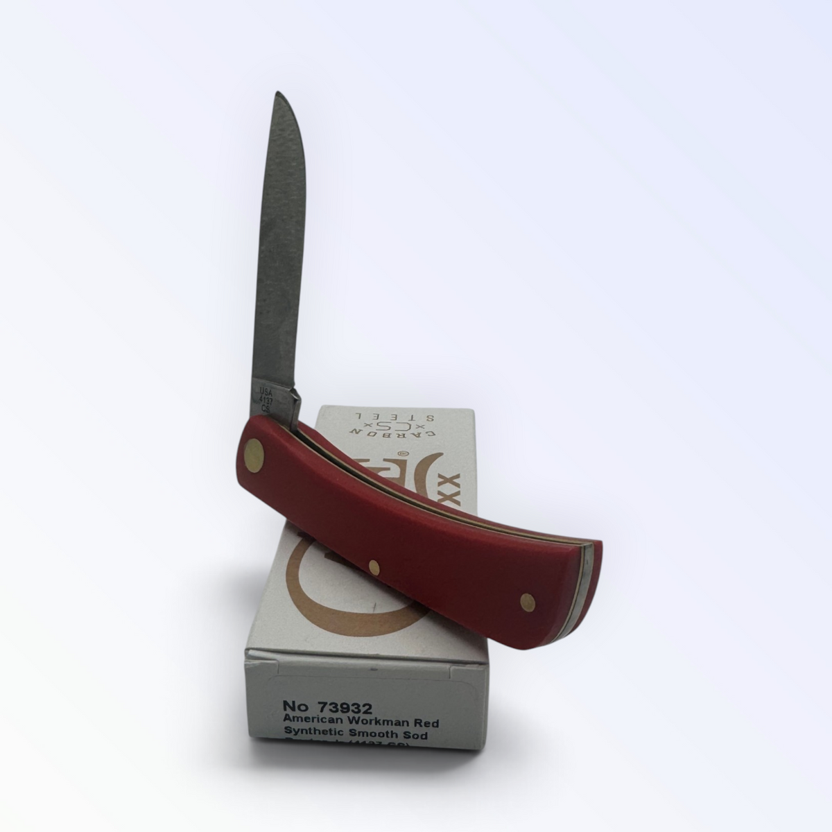 Pigeon Roost Knives Case XX American Workman Sod Buster Jr pocket knife with a red synthetic handle and carbon blade