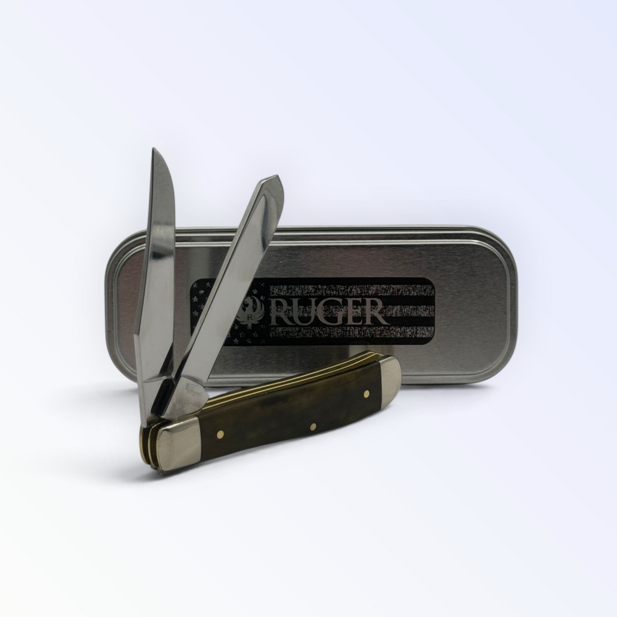 Pigeon Roost Knives Case XX Ruger Mini Trapper with olive green bone handle and two blades in a branded gift tin