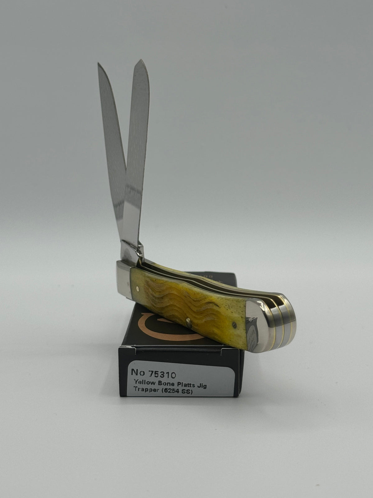 Pigeon Roost Knives Case XX Trapper pocket knife with yellow jigged bone handle and two stainless steel blades